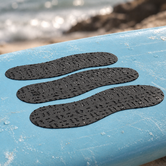 EvoGRIP Surf Grip Pads installed on a blue surfboard — side-angle visualization